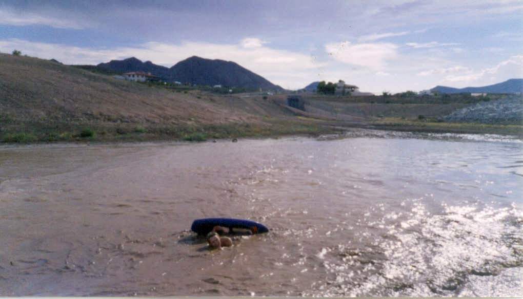 mud kneeboarding- needless to say it don't taste good to biff it.jpg - 92kB